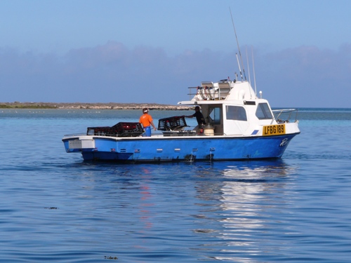 BUCK AND HIS BOAT , BIG RAT ISLAND